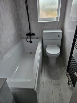 toilet bath shower and radiator bathroom installed by Northern Plumbing & Heating in Hull